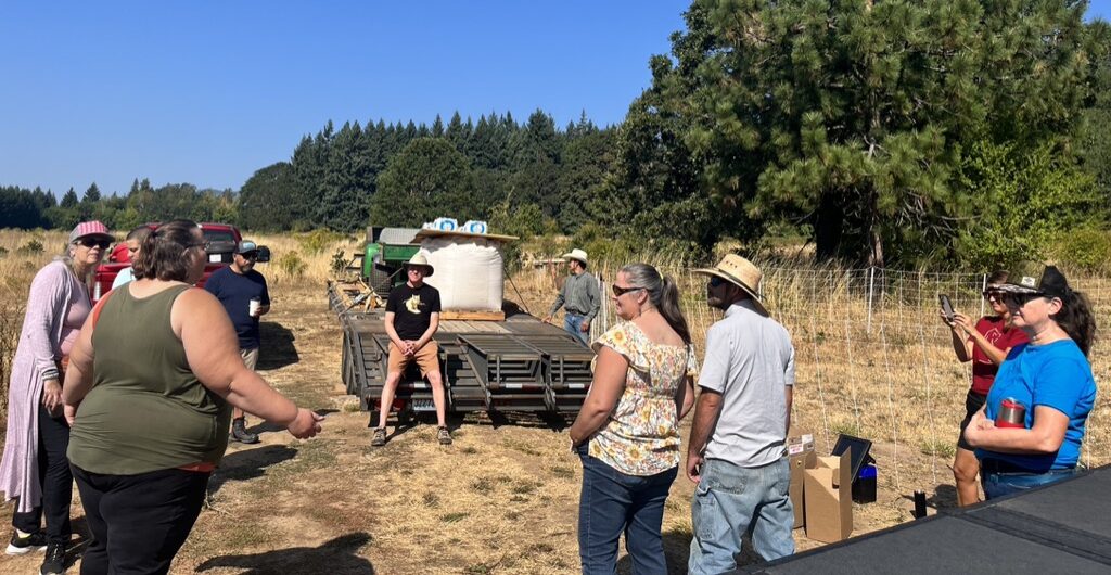 Mountain Lion Foundation volunteers gather to build deterrents on a farm.