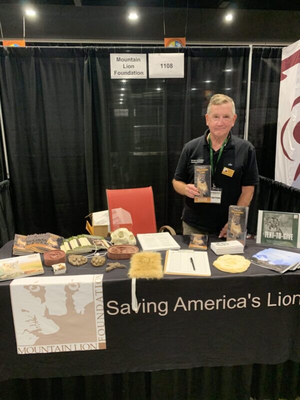 Tom Forms tabling an event for the Mountain Lion Foundation